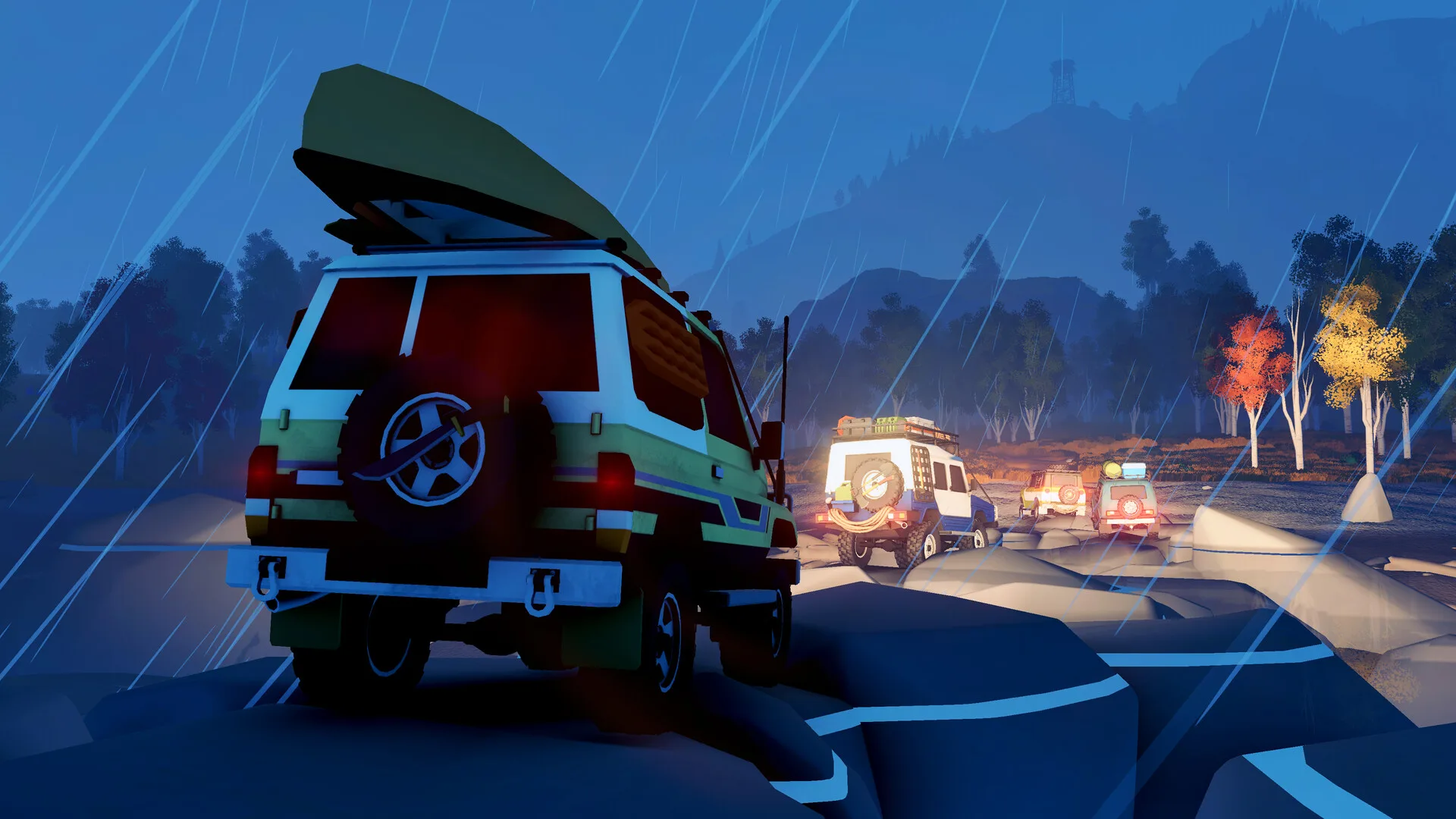Over the Hill official screenshot of a convoy crossing wet rocks in heavy rain